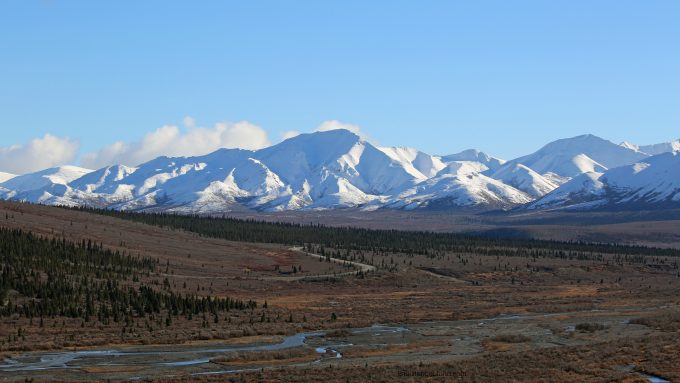 Snow Covered mountains in Denali National Park with tundra below