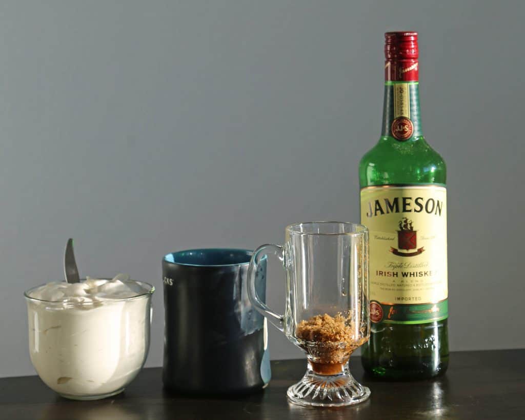 The Perfect Irish Coffee Recipe. Here is a traditional Irish Coffee Cocktail with Jameson we got while visiting Ireland. It is easy to make with how to make recipe and a bit of Irish love. #irishcoffee #recipe #jameson #howtomake