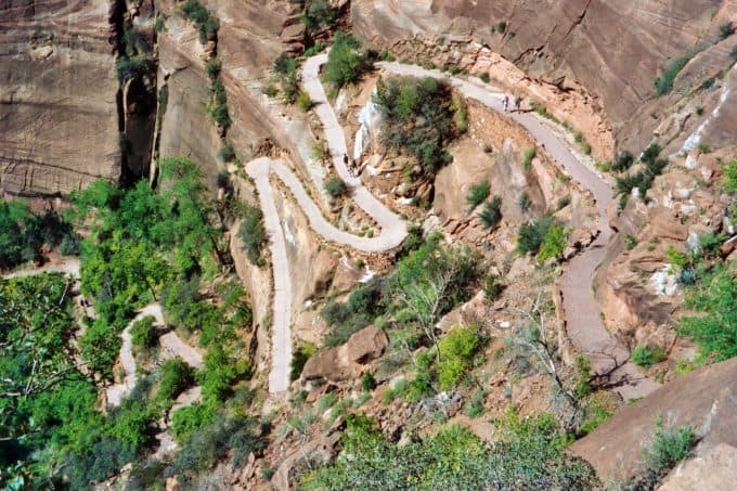 https://www.parkrangerjohn.com/wp-content/uploads/2017/03/Looking-down-from-Walters-Wiggles-Angerls-Landing-Hike-Zion-National-Park.jpg