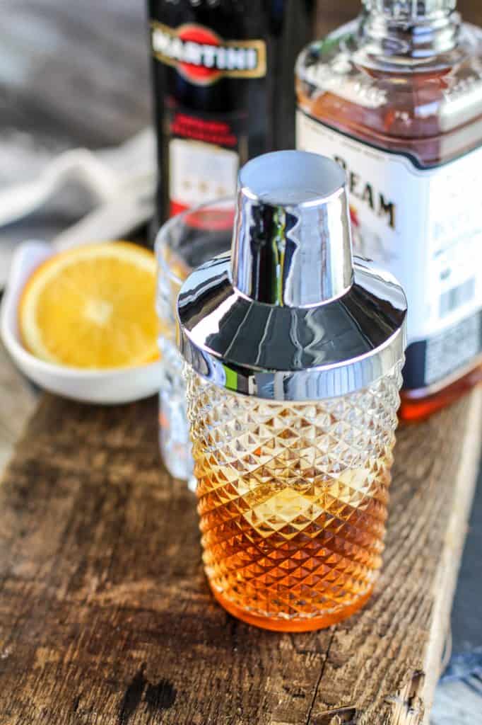 Classic Manhattan Cocktail Recipe with an Orange Twist that is perfect for happy hour, dinner parties, bachelor parties or guys night. 