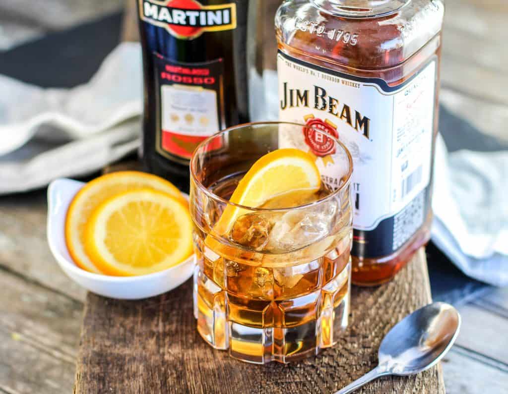 Classic Manhattan Cocktail Recipe with an Orange Twist that is perfect for happy hour, dinner parties, bachelor parties or guys night. 