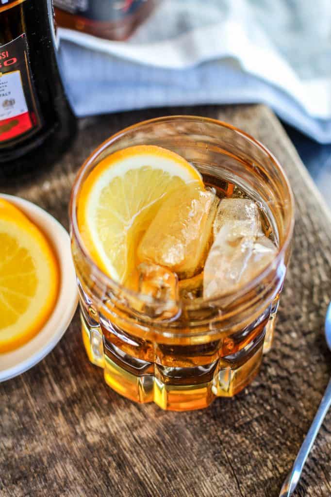 Classic Manhattan Cocktail Recipe with an Orange Twist that is perfect for happy hour, dinner parties, bachelor parties or guys night. 
