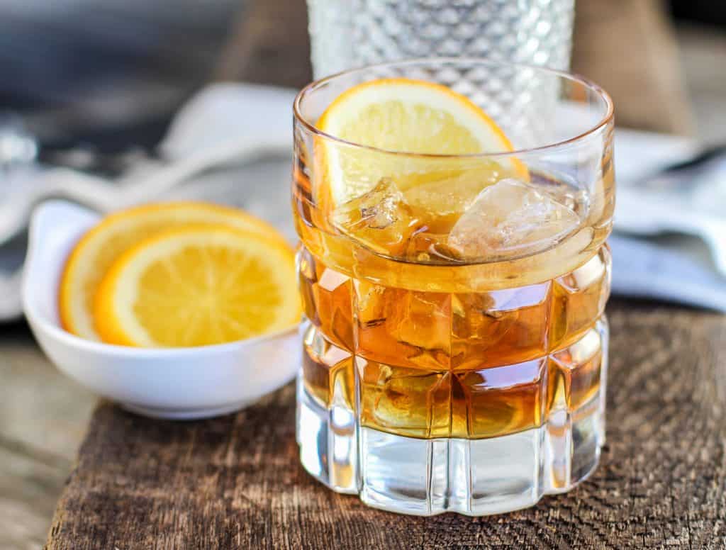 Classic Manhattan Cocktail Recipe with an Orange Twist that is perfect for happy hour, dinner parties, bachelor parties or guys night. 