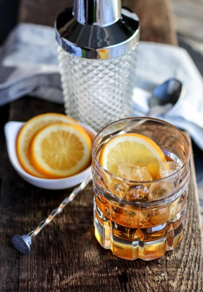 Classic Manhattan Cocktail Recipe with an Orange Twist that is perfect for happy hour, dinner parties, bachelor parties or guys night. 