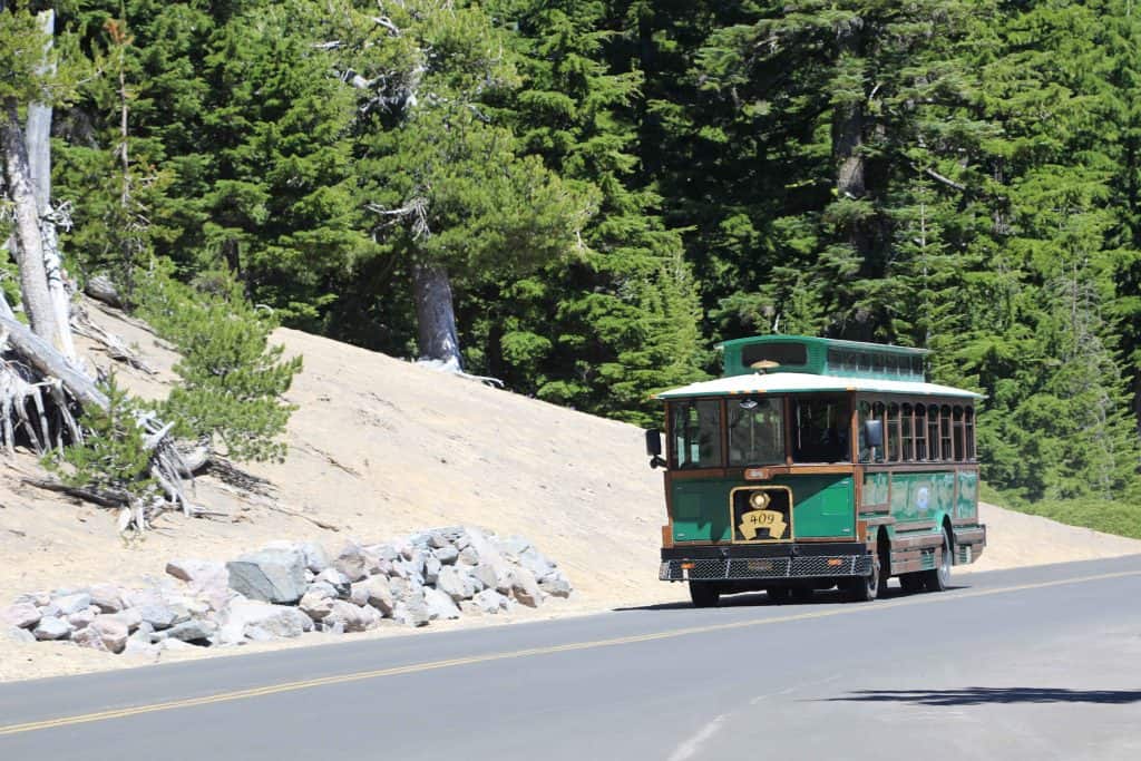 Crater Lake National Park in Oregon is the perfect family vacation. Things to do in the summer include camping, hiking, watching sunrise or sunset, swimming, play in the snow, take a boat ride to Wizard Island and photography. If you plan far enough in advance you can also stay in a park lodge! 