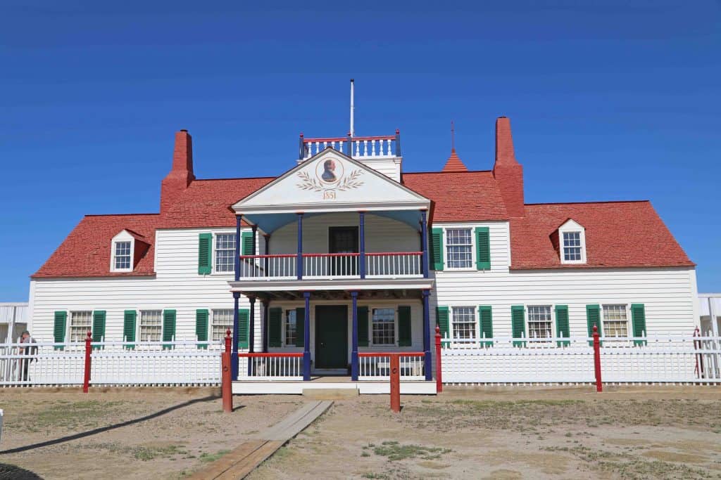 Fort Union Trading post with a blue sky behind it 