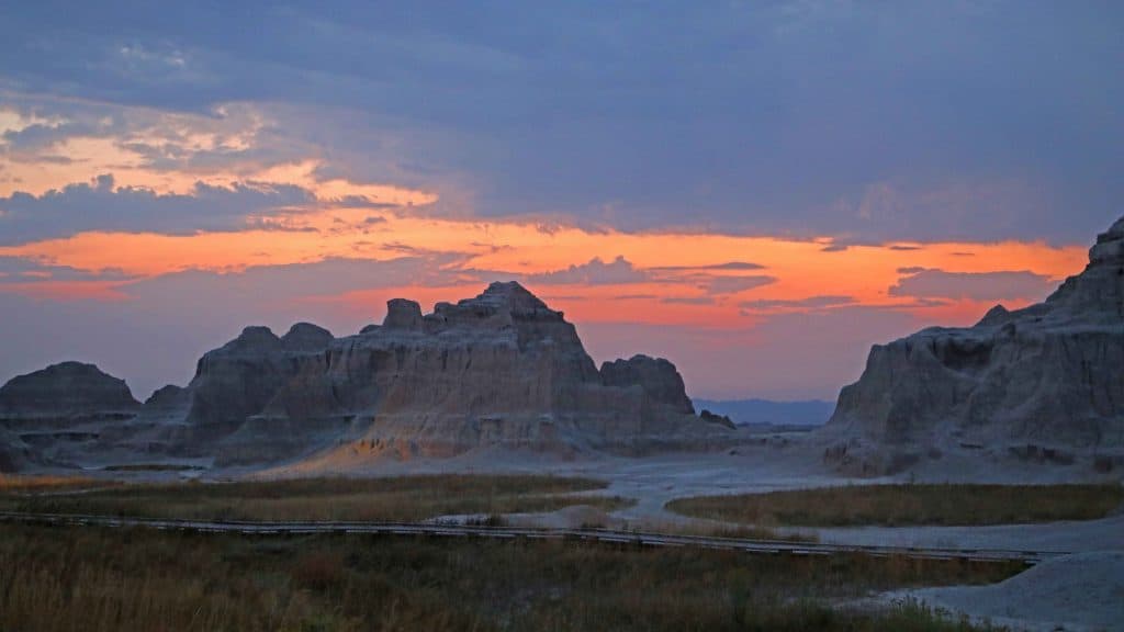 Things to do at Badlands National Park in South Dakota include Road Trips/Auto Touring, Photography, hiking, where to see sunrise and sunset, wildlife viewing plus visit nearby Wall Drug and Minuteman Missile National Historic Site. #badlands #nationalparks #blackhills #southdakota