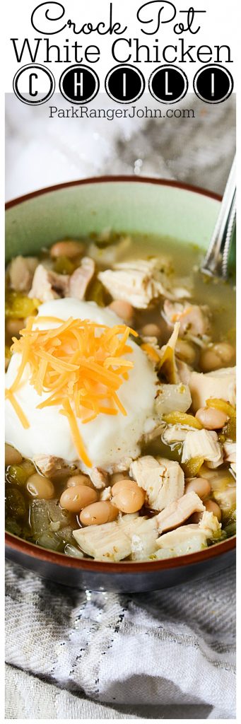 Super easy slow cooker Crock Pot White Chicken Chili Recipe. Chili is a great comfort food, especially in the winter after spending the day outdoors. You and your family will all go for seconds for this creamy deliciousness! #crockpot #slowcooker #chicken #chili #comfortfood