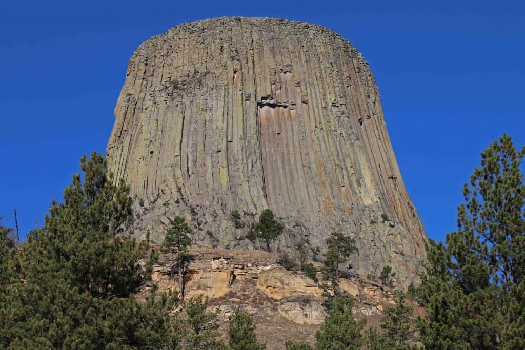 Park Rangers Guide to Devils Tower National Monument in Wyoming USA. Article includes travel tips and things to do like climbing, hiking, road trip ideas and even Close Encounters of a 3rd. Kind! #devilstower #devilstowernationalmonument #nps #nationalpark
