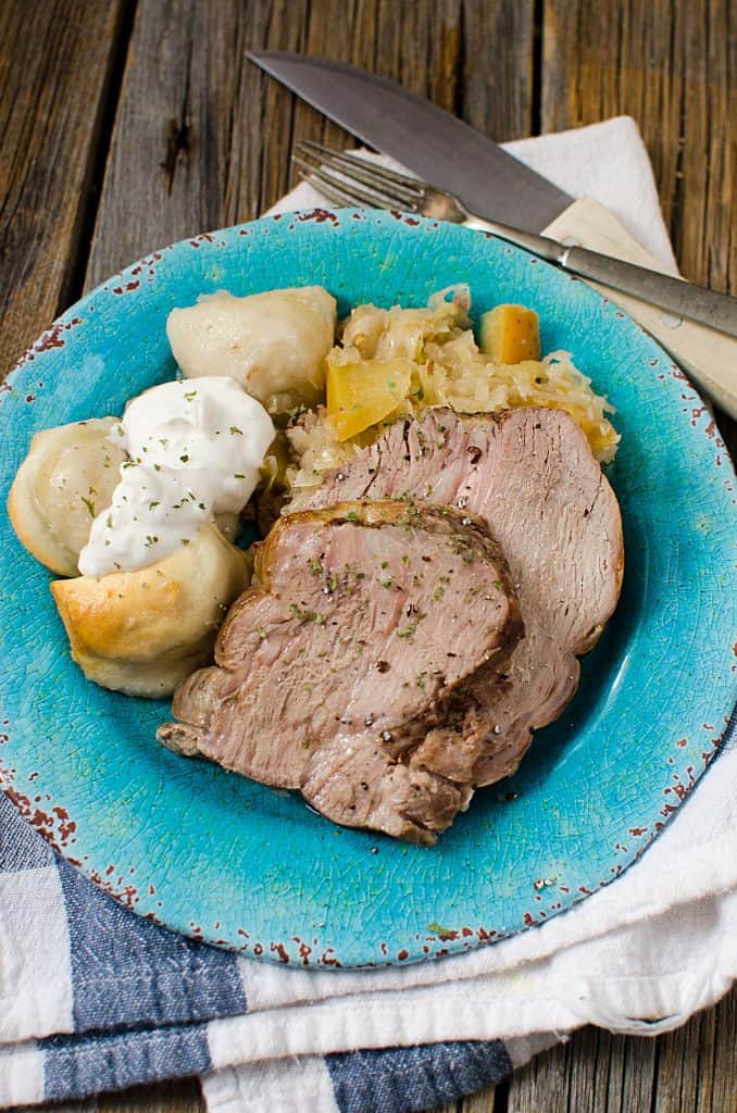 Slow Cooker Crock Pot German Pork Roast & Sauerkraut is one of my favorite dishes. It makes cooking dinners for the family a snap using this easy to follow recipe.
