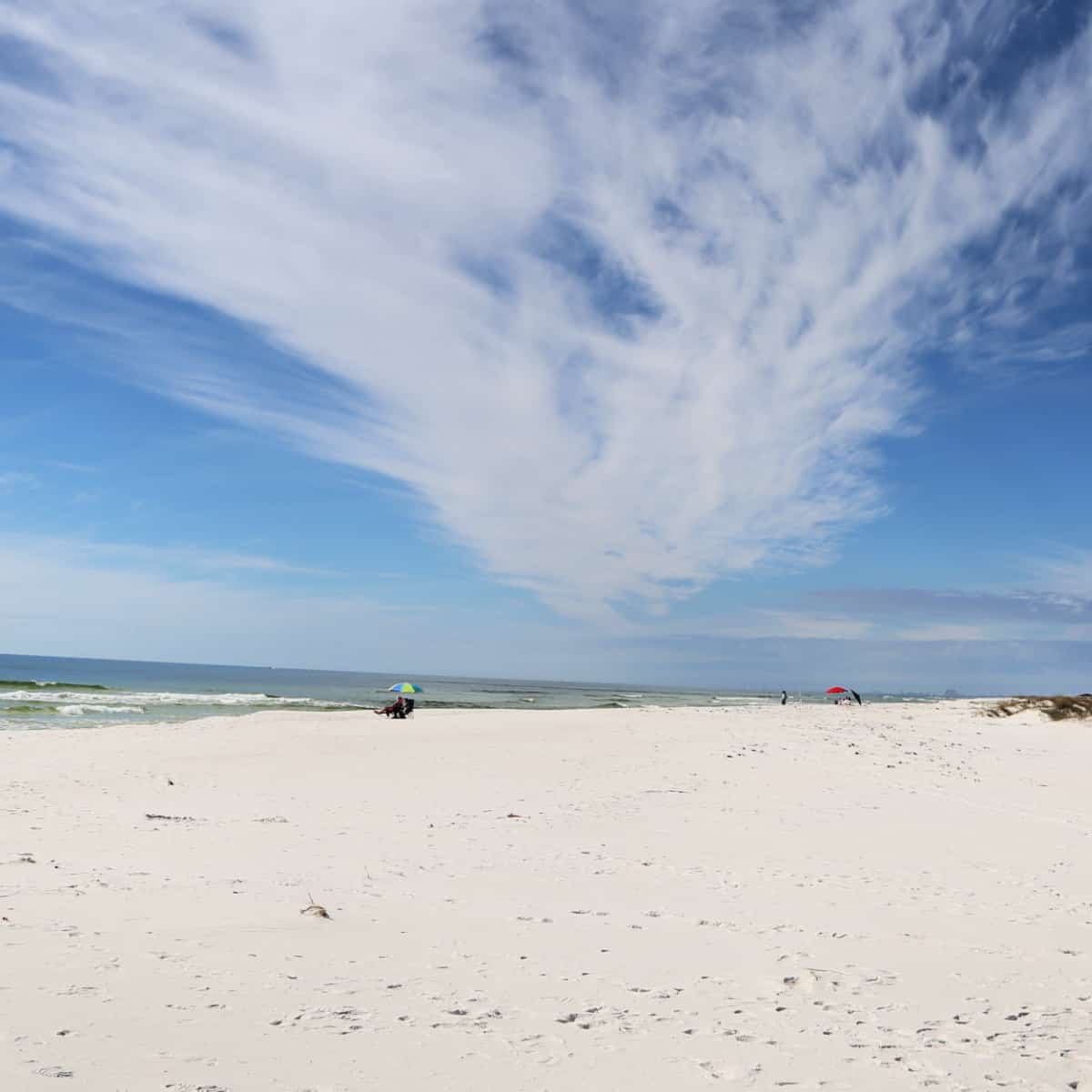 sitting in beach chair at Gulf Islands National Seashore Florida