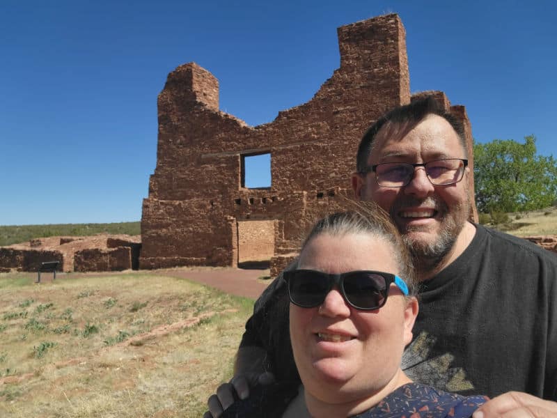 Park Ranger John and Tammilee Tips in front of Quarai Ruins, Salinas Pueblo Missions National Monument, New Mexico