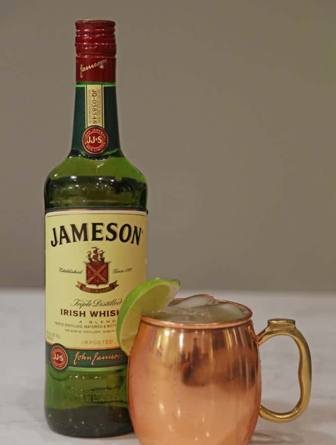 This Irish Mule recipe is one of my all-time favorite drinks! Whether you want to celebrate Saint Patricks Day or feel like you were transported to Ireland, this simple to make cocktail only requires Jameson, Ginger Beer, and fresh Lime Juice #irishmule #recipe #drink #jameson #cocktail