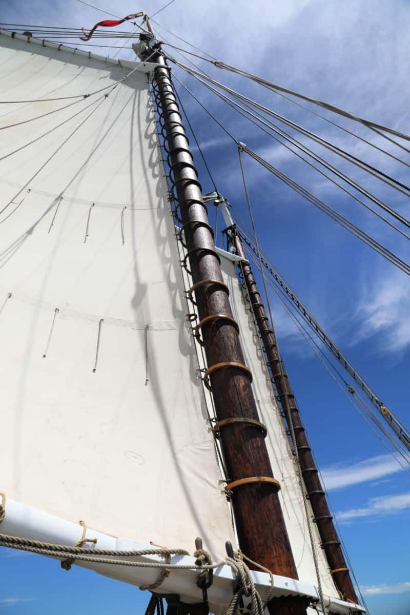 Sail extended on the 1891 Scow Schooner Alma while sailing in the San Francisco Bay