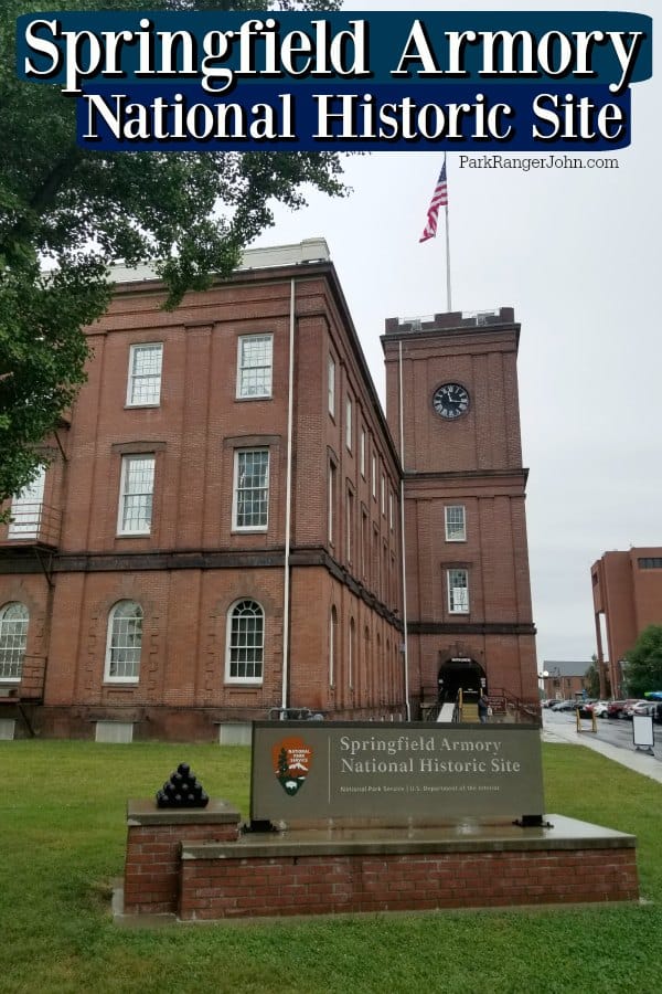 Springfield Armory National Historic Site text written over the park entrance sign and building with an American Flag flying