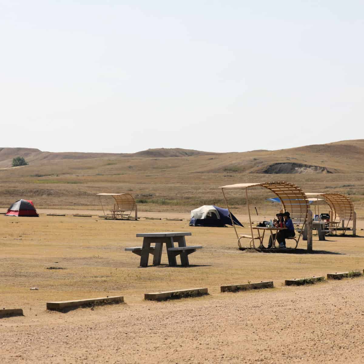 Photo of people camping at Sage Creek Campground in Badlands National Park in South Dakota