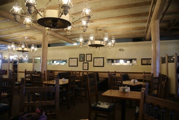dining room with antique looking chandeliers
