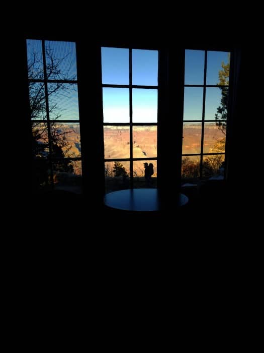 Sunrise over the Grand Canyon from inside a window 