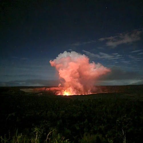 View of the Orange Glow from Kilauea Caldera at night from Volcano House National Park in the Big Island of Hawaii