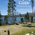 Photo of campsite along Bass Lake with text "Bass Lake Camping Guide by ParkRangerJohn.com"