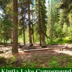 Photo of a campsite in Kintla Lake Campground with text "Kintla Lake Campground Glacier National Park by ParkRangerJohn.com"