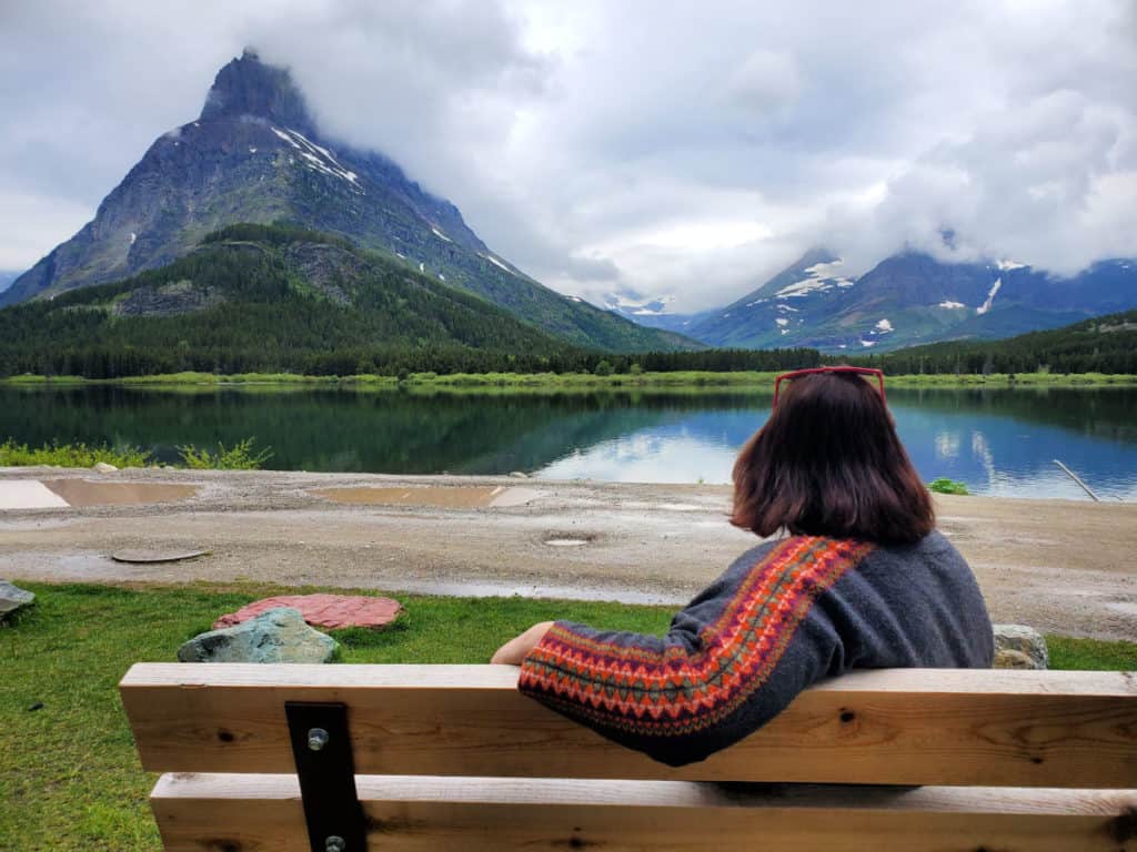 Relaxing on a bench outside the Many Glacier Hotel