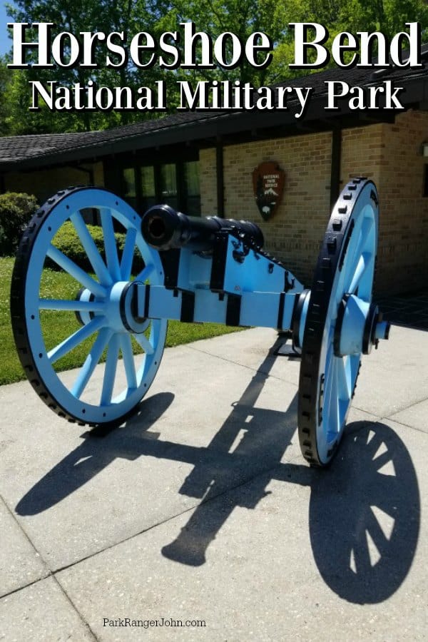 Horseshoe Bend National Military Park over a blue cannon and the National Park Service Emblem