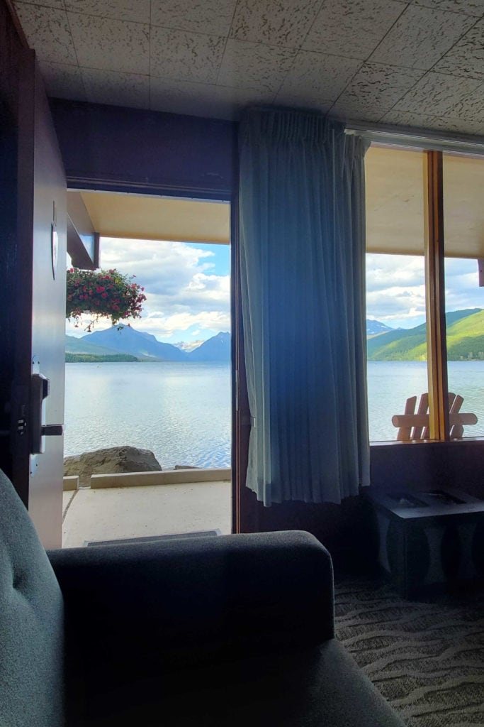 Back door from room opens to porch overlooking Lake McDonald at The Village Inn at Apgar
