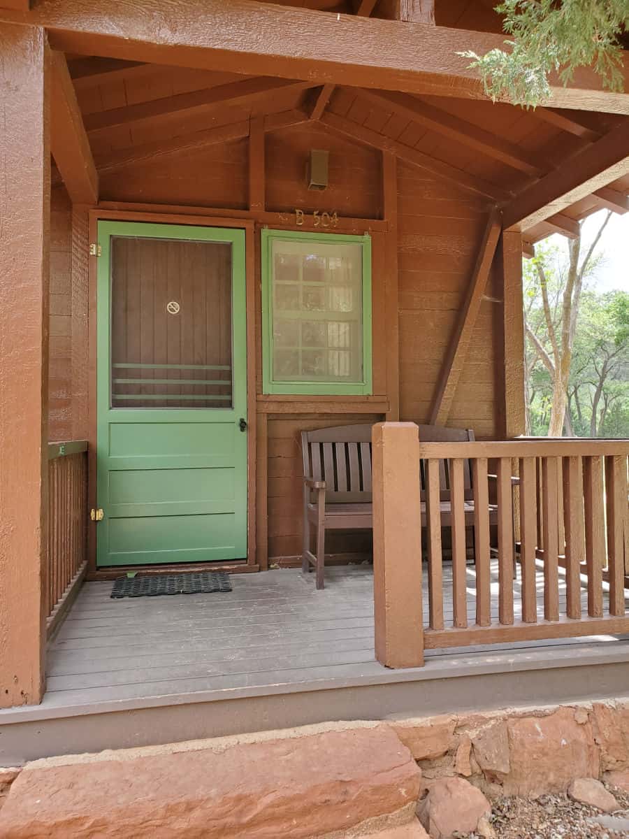 Nice front porch on the Zion Cabins include a bench to sit on
