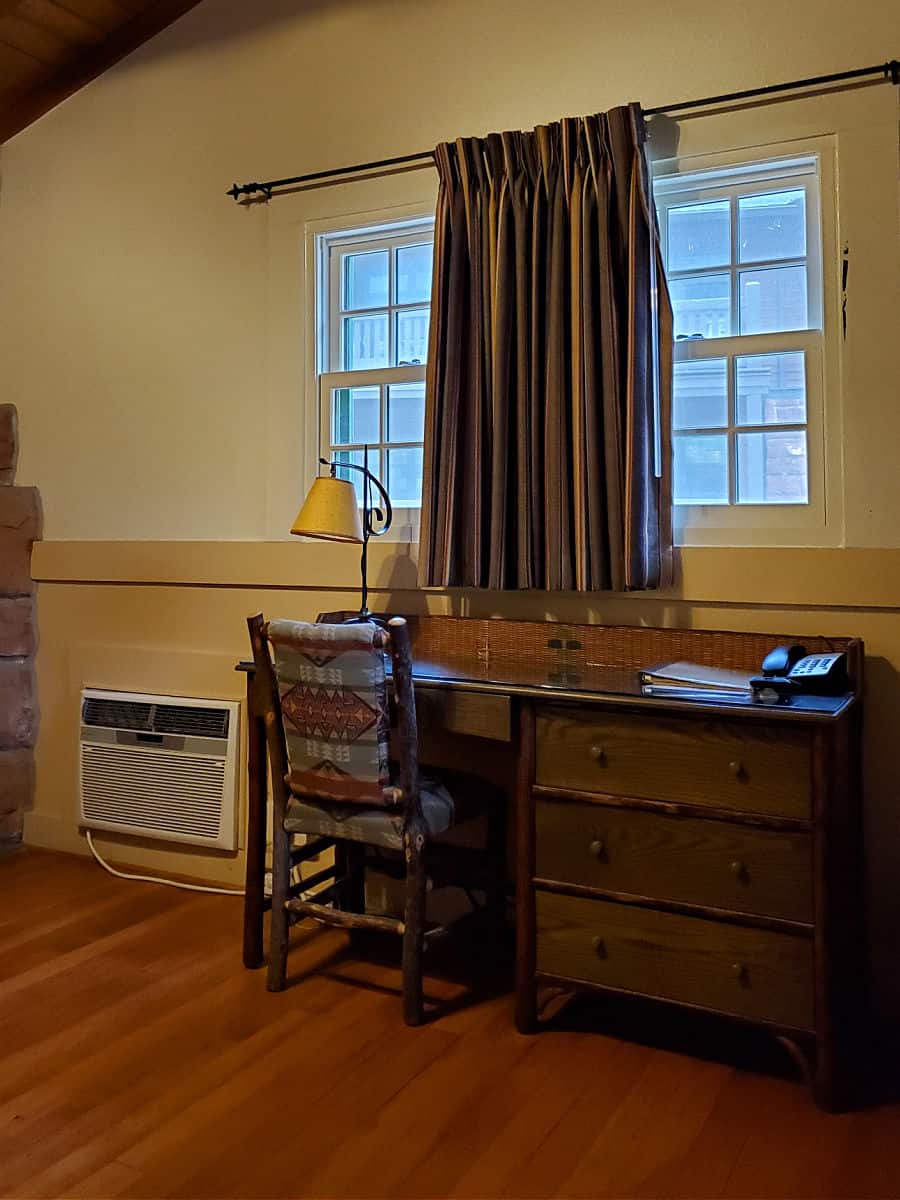 Nice desk and chairs to plan out the next day in the Zion Lodge Cabons