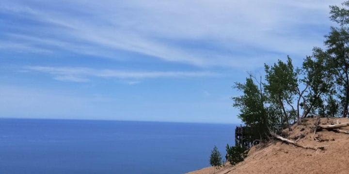 Epic view of hiking in the sand along Lake Michigan at Sleeping Bear Dunes National Lakeshore