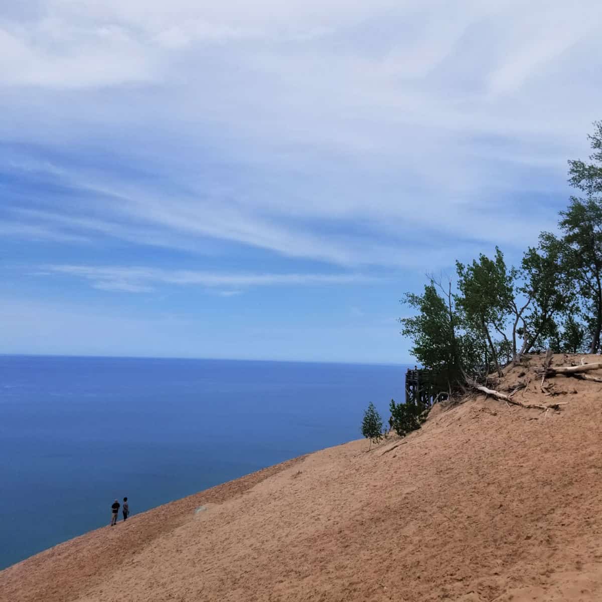 Epic view of hiking in the sand along Lake Michigan at Sleeping Bear Dunes National Lakeshore