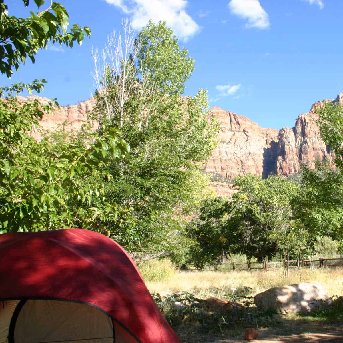 Red tent in the South Campground with views of red rocks