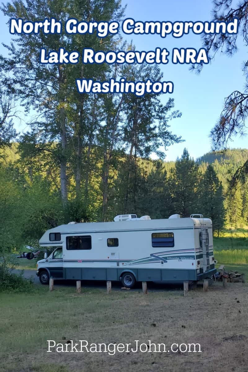 RV in campsite at North Gorge Campground with text reading :North Gorge Campground Lake Roosevelt National Recreation Area - Washington by ParkRangerJohn.com"