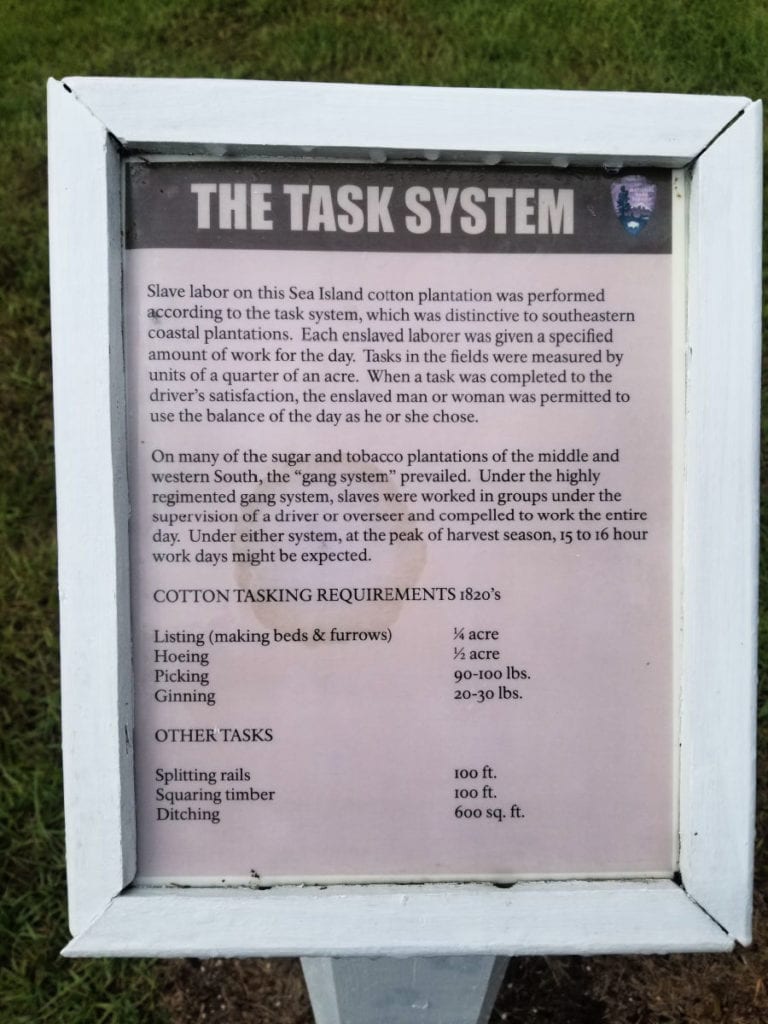 The Task System interpretative panel at Gullah Geechee. Slaves were either in a task system or gang system that determined the amount of work to be completed each day, oftentimes reaching 15-16 hours a day.