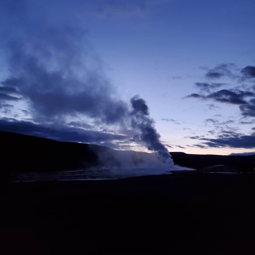 Old Faithful in Yellowstone National Park at Dawn