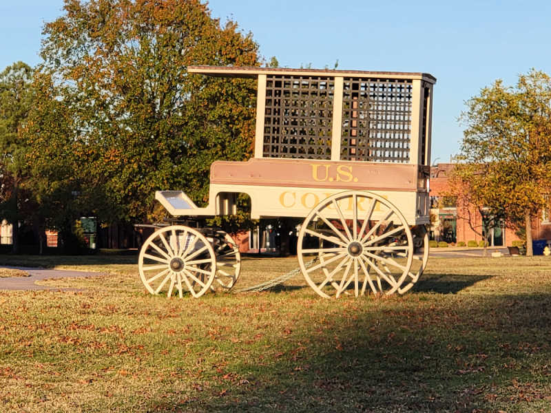 Historic US Court Carriage on grass at Fort Smith NHS