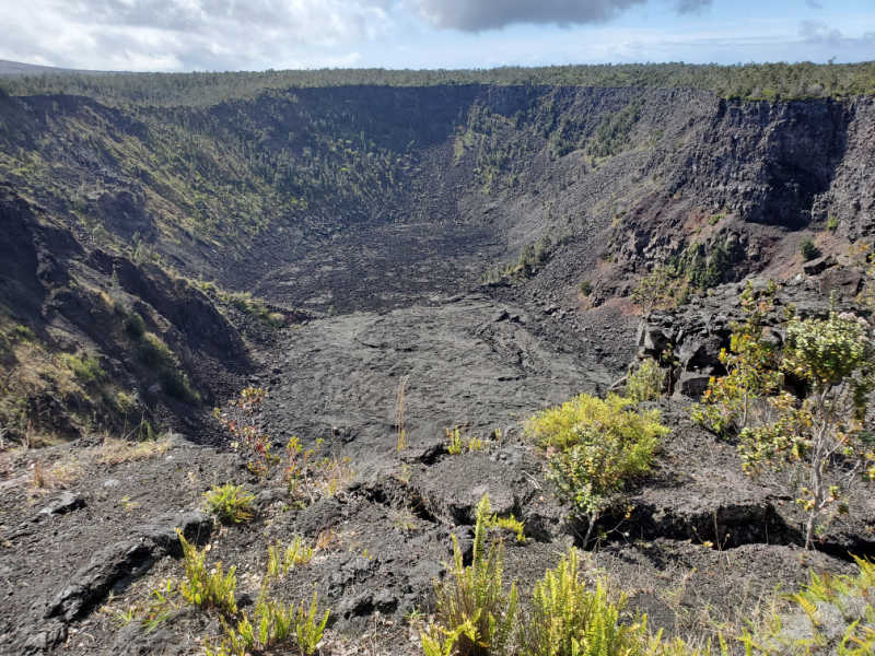 Dark lava stone in a crater in Volcanoes National Park