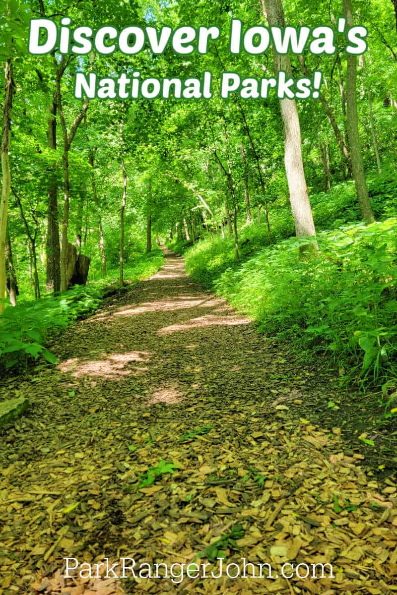 Go for a hike and discover Iowa's National Parks like the trail in the photo of Effigy Mounds National Monument