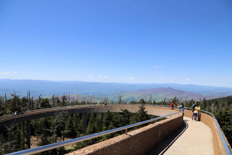 Clingmans dome observation tower walkway with people looking out at the views of Great Smoky Mountains National Park