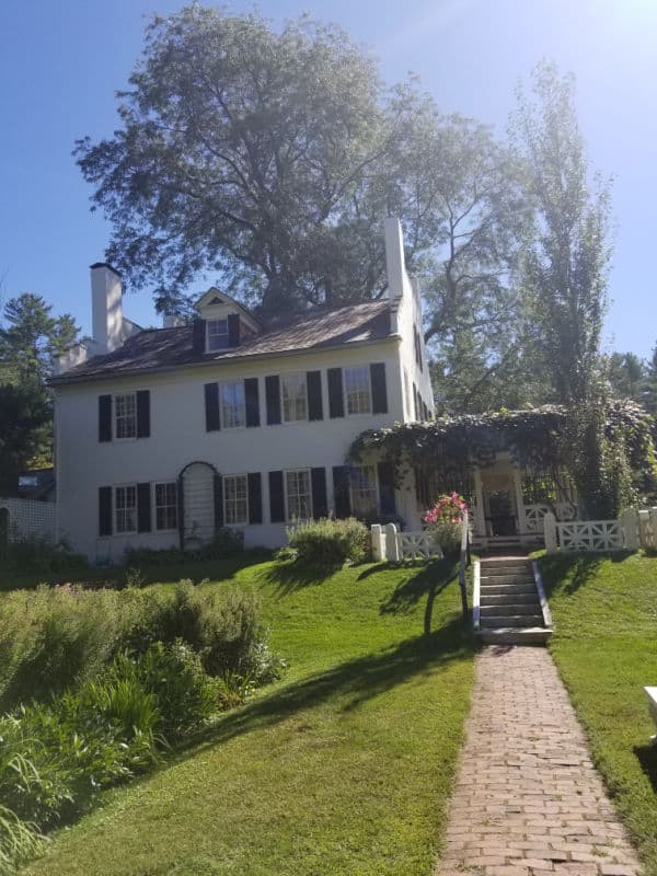 White two story home with brick walkway leading up to it, Aspet house, Saint Gaudens National Historical Park, New Hampshire