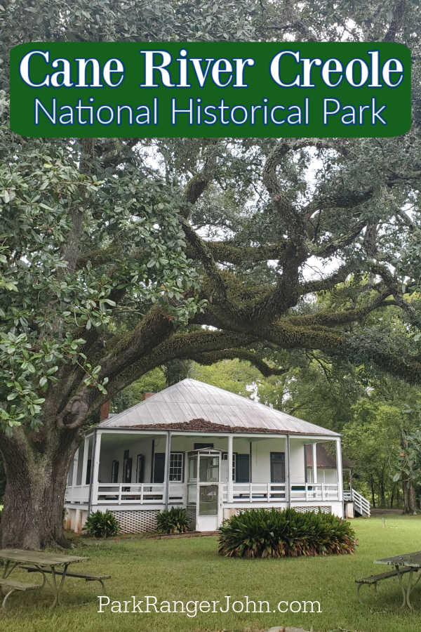 Cane River Creole National Historical Park text printed over a white plantation home and picnic tables