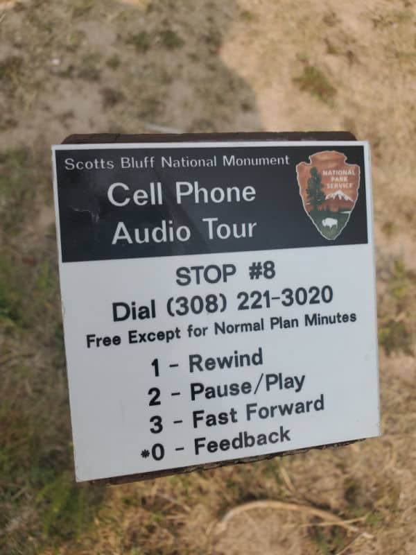 Cell phone tour sign with directions atScotts Bluff National Monument, Nebraska 