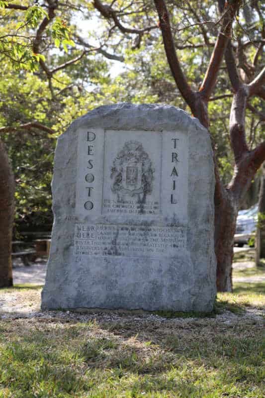 DeSoto Trail Marker surrounded by trees at De Soto National Memorial, Florida