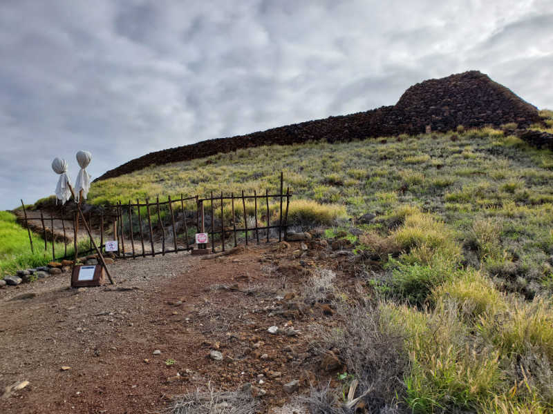 gate with markers leading up to Pu`ukoholā Heiau National Historic Site, Big Island of Hawaii