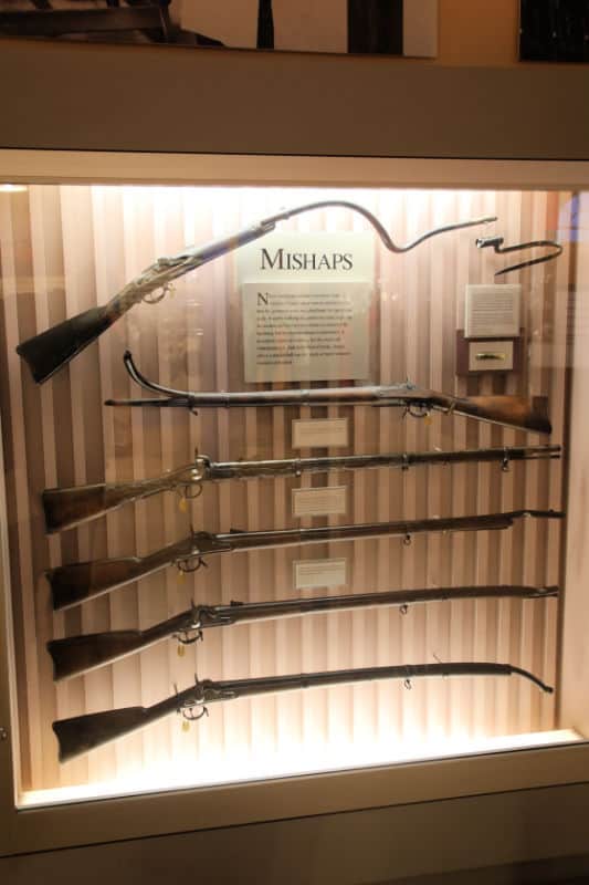 Mishap Guns in a glass display showing mistakes or issues at Springfield Armory NHS