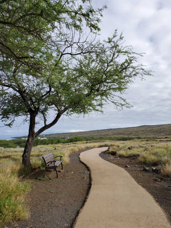 paved walking trail leading through Pu`ukoholā Heiau National Historic Site, Big Island of Hawaii