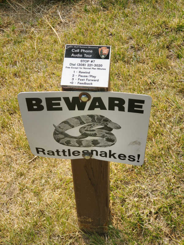 beware of rattlesnake sign in Epic views from Scotts Bluff National Monument, Nebraska