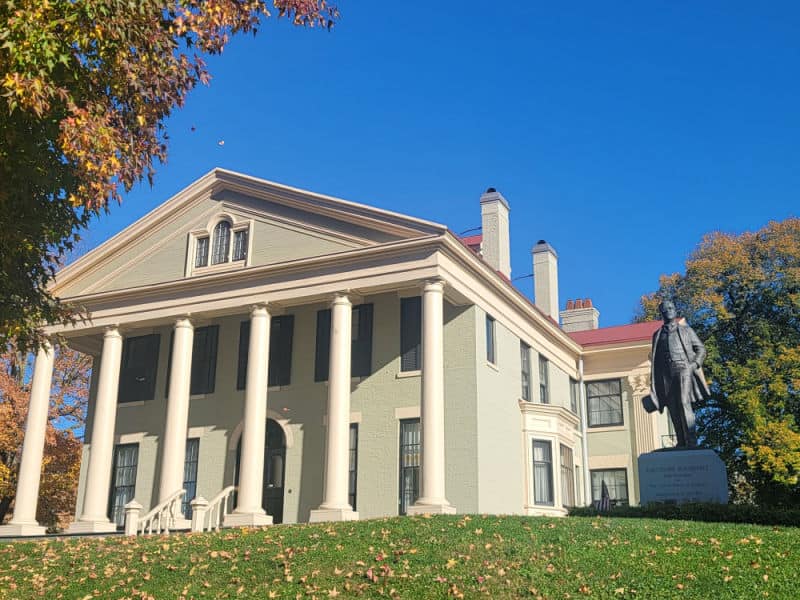 Wilcox mansion and Theodore Roosevelt statue at the front of Theodore Roosevelt Inaugural Site National Historic Site, New York
