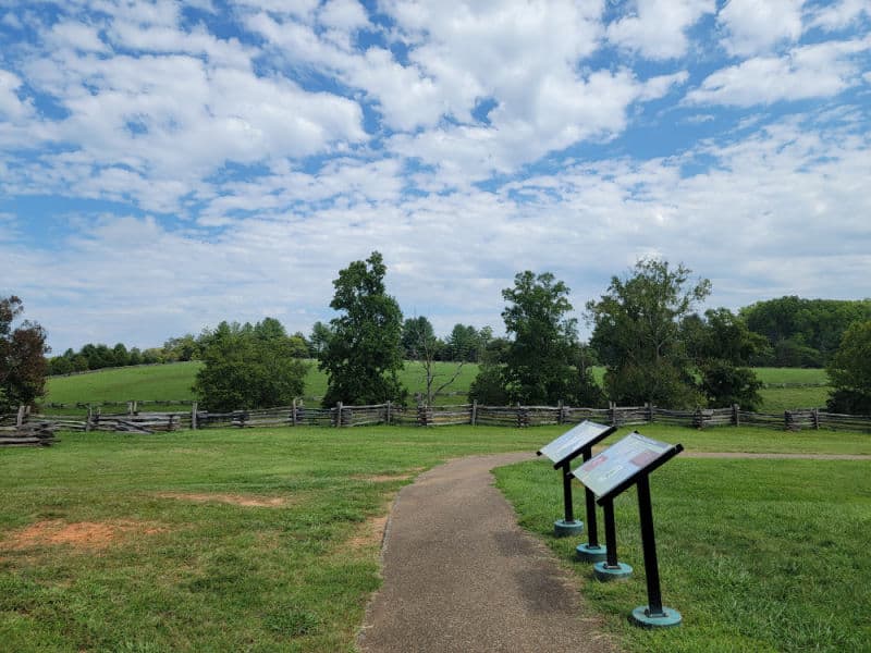 trail past two interpretive panels in Booker T Washington National Monument 